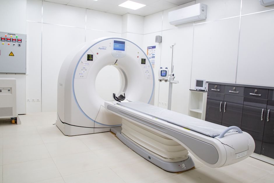 An MRI scanner in an empty hospital imaging room