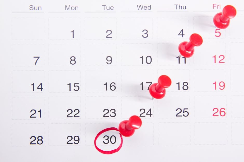A calendar page with a run of days marked off in pen